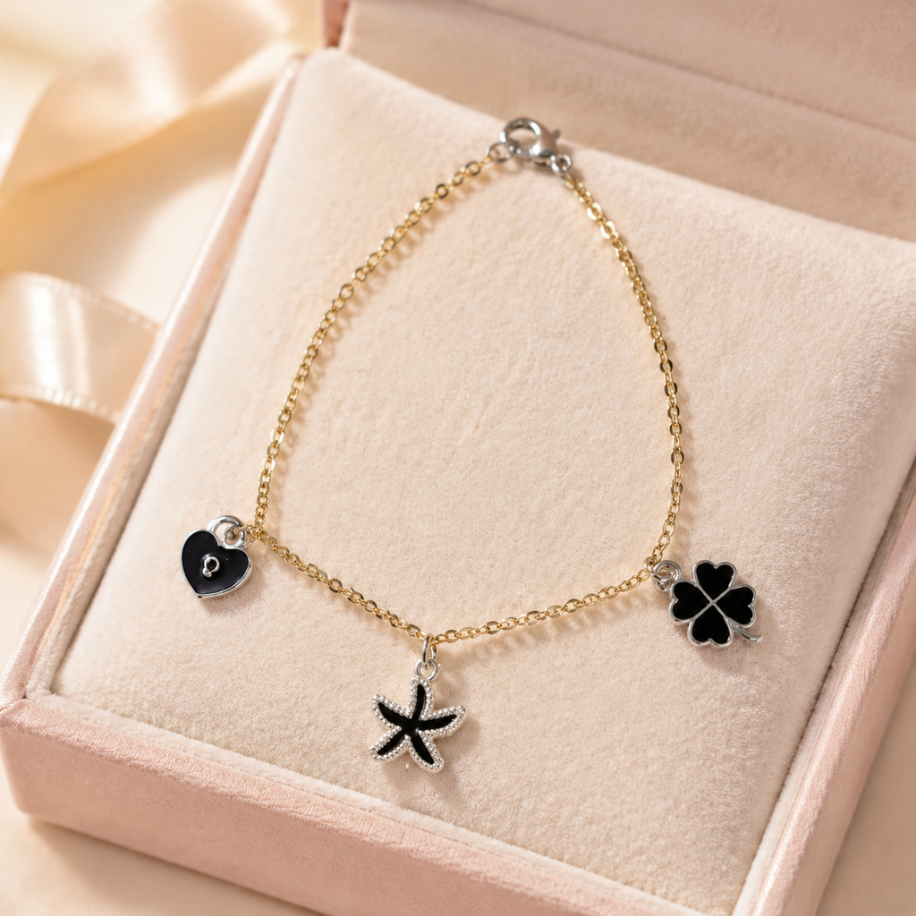 Elegant Gold Charm Bracelet with Black Heart