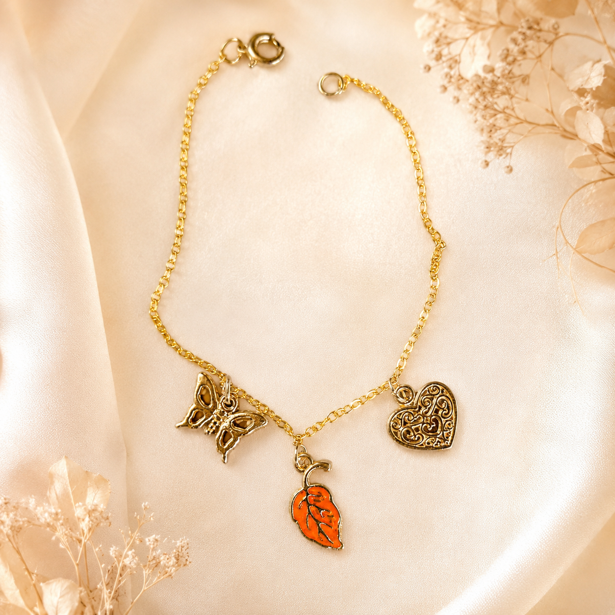 Gold Charm Bracelet with Butterfly, Heart & Orange Leaf
